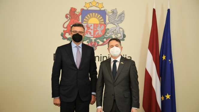 finanšu ministrs Jānis Reirs un Eirogrupas prezidents Paskals Donohū