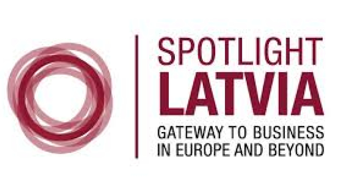 Attēlā uz balta fona ir redzams konferences "Spotlight Latvia" logo
