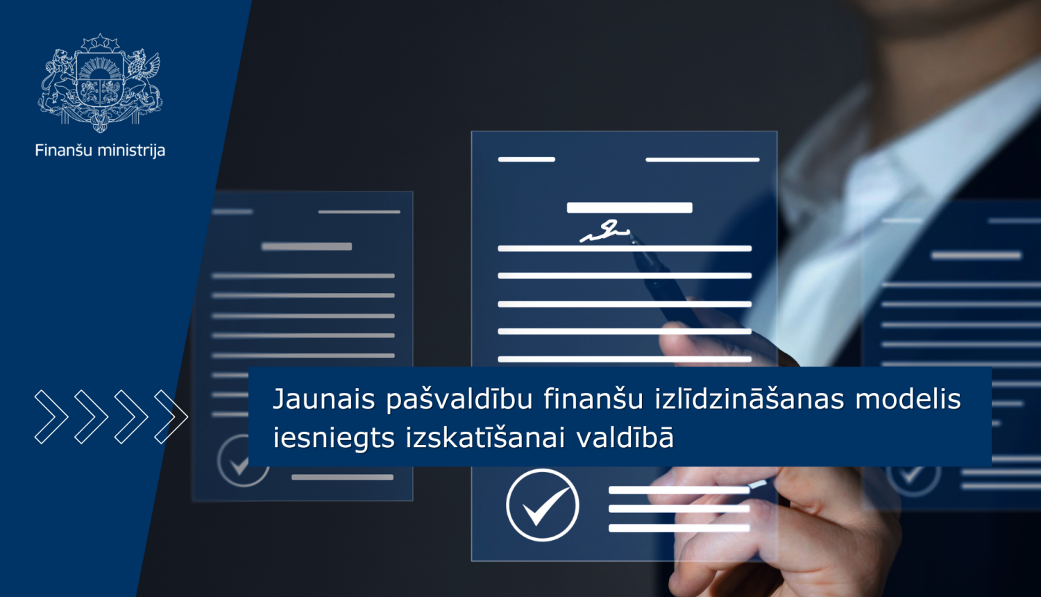 ilustrāciju ar dokumentu parakstīšanu, uz attēla ir teksts "Jaunais pašvaldību finanšu izlīdzināšanas modelis iesniegts izskatīšanai valdībā"